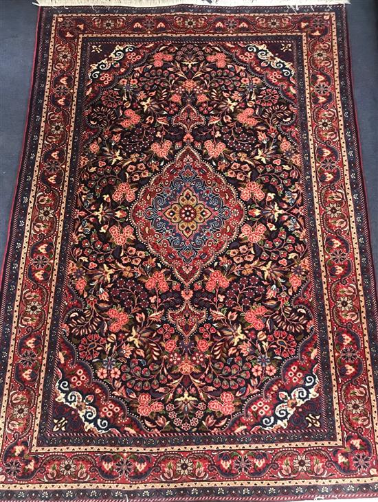 A Persian red ground Malayaiz rug 152 x 97cm